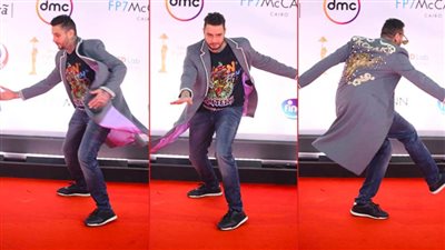 حركات أحمد الفيشاوي علي الريد كاربت في حفل ختام القاهرة السينمائي