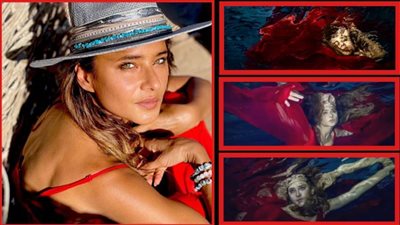 بالفستان الأحمر .. جلسة تصوير جديدة لنيللي كريم تحت الماء 