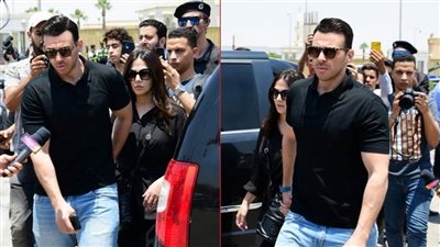 دنيا سمير غانم برفقة زوجها رامي رضوان خلال تشييع جنازة سمير صبري